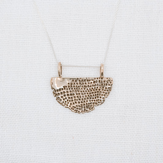 TELLA BRASS PENDANT NECKLACE