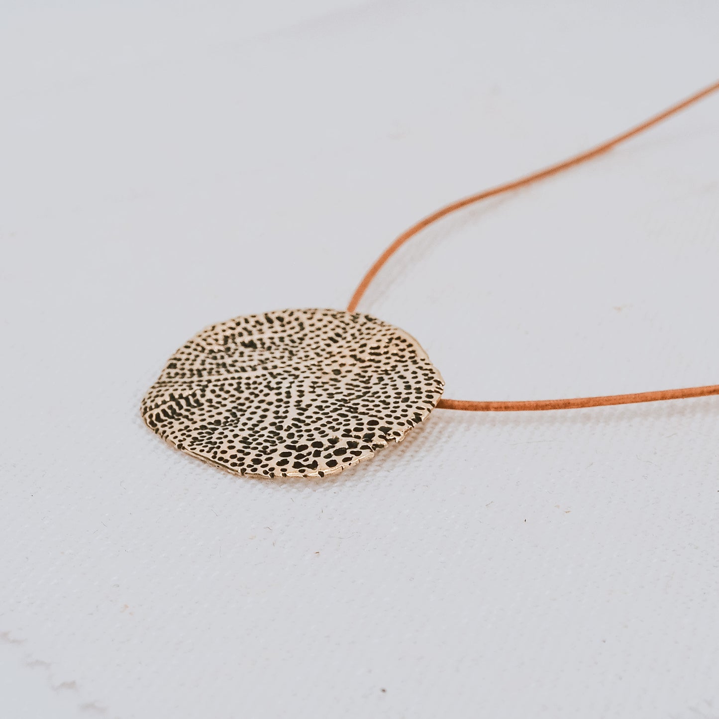 VEIL CORAL BRASS PENDANT NECKLACE