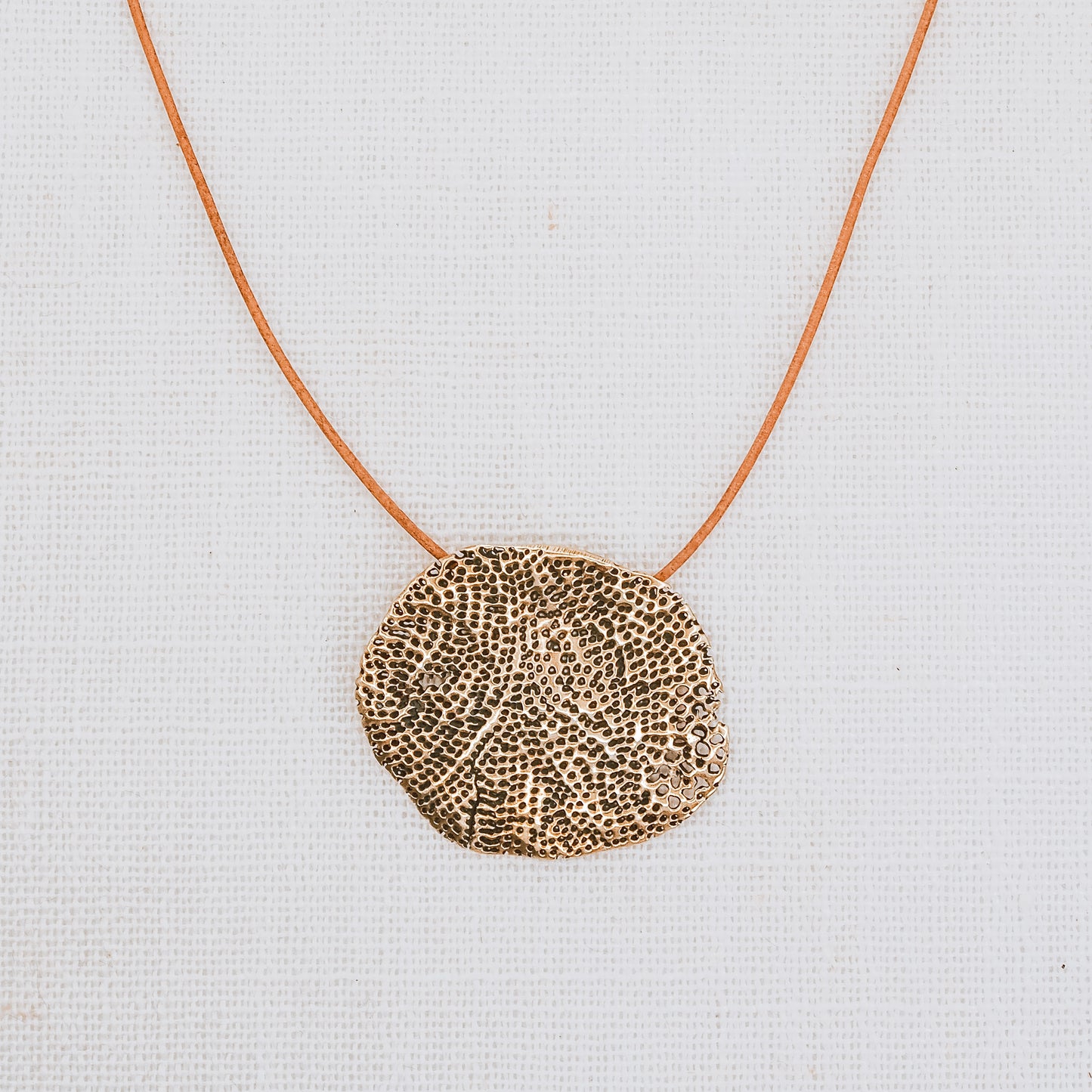 VEIL CORAL BRASS PENDANT NECKLACE