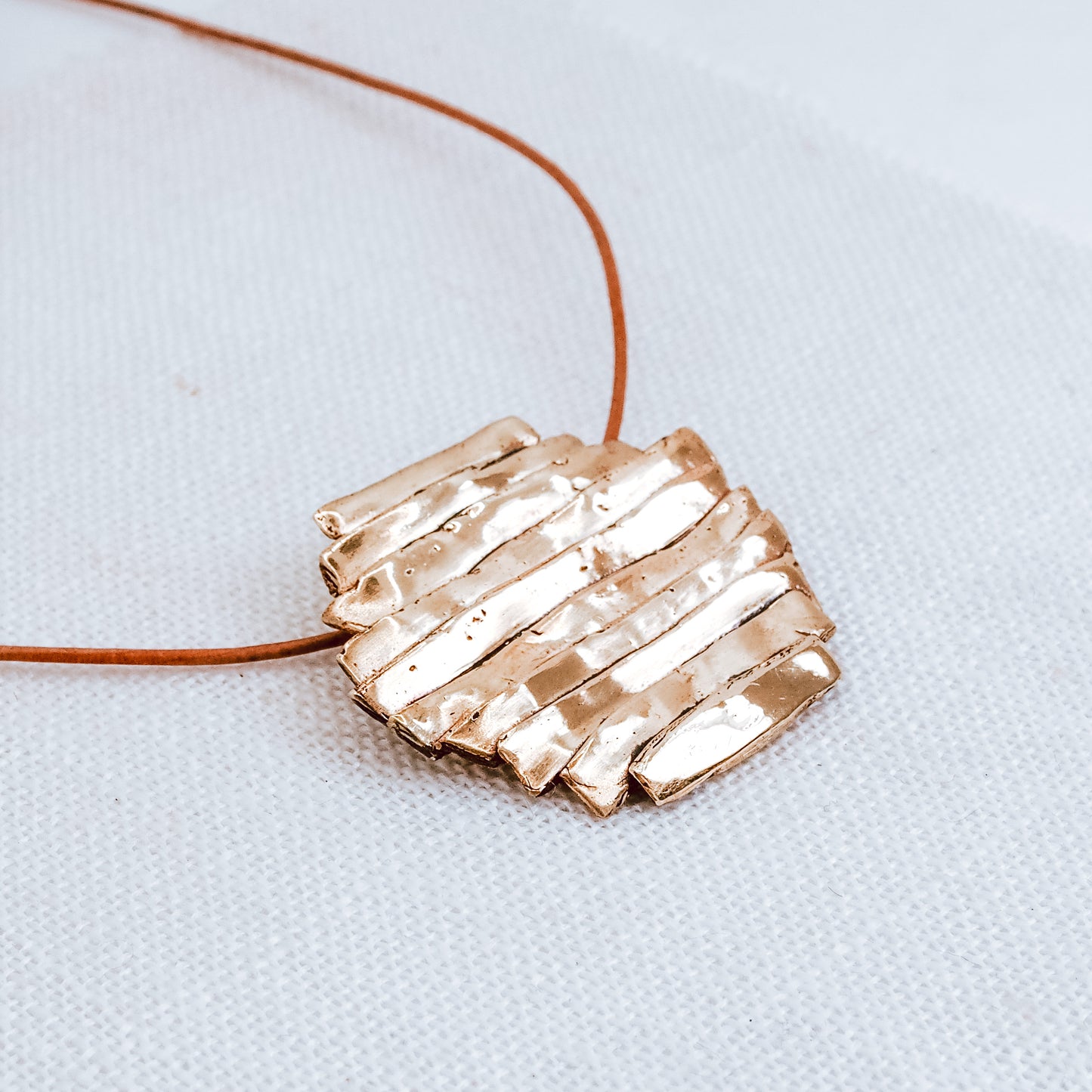 TERRAIN BRASS PENDANT NECKLACE