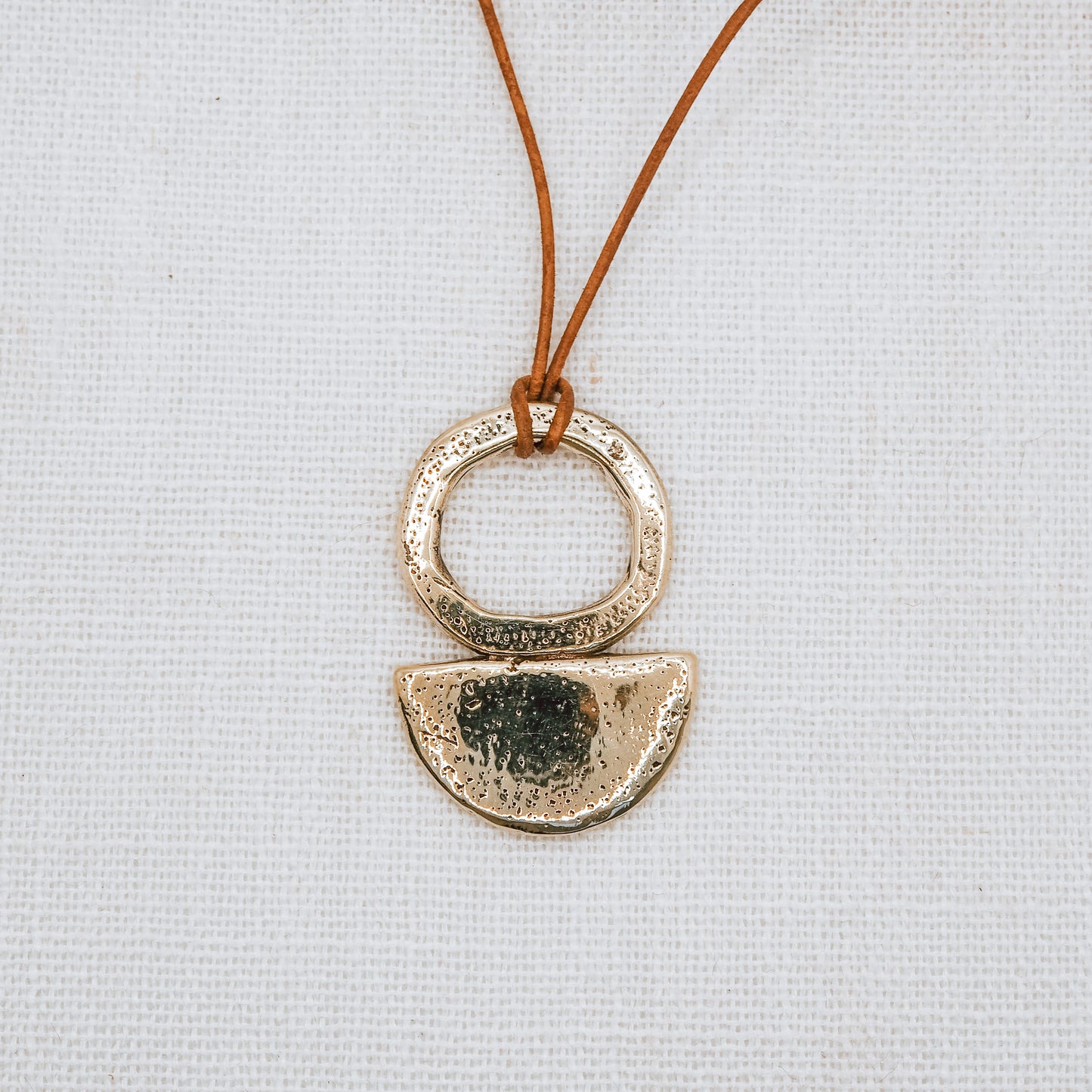 MEDIA LUNA BRASS PENDANT NECKLACE