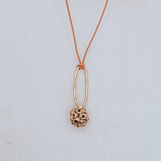 LUNA SEEDPOD BRASS PENDANT NECKLACE